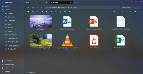The same folder with actual thumbnails, including a photo and a video frame