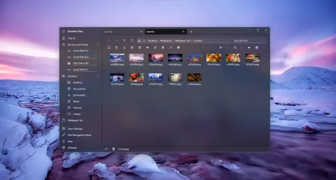 The original Shrestha Files in a dark theme, showing a folder of photos