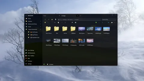A folder of photos with the Windows XP icon pack in a dark theme