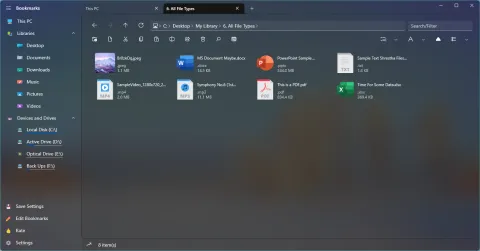 The same files as tiles, each with an icon, name, type and size